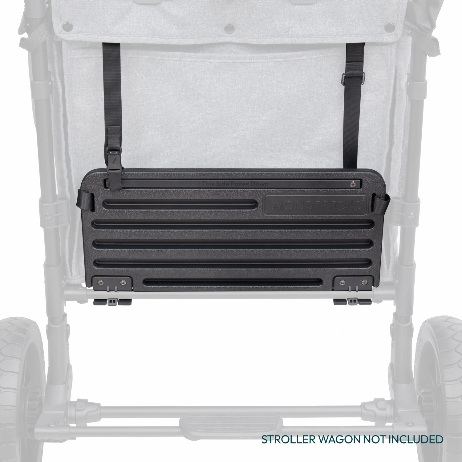 Buddy Board securely attached to the rear of a WonderFold W4 stroller wagon 