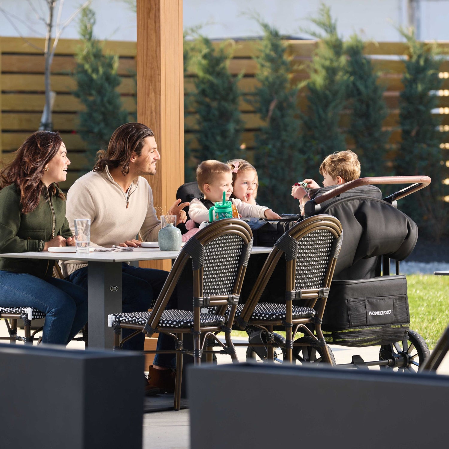 Stroller wagon raised seats next to table for lunch stroller high chair