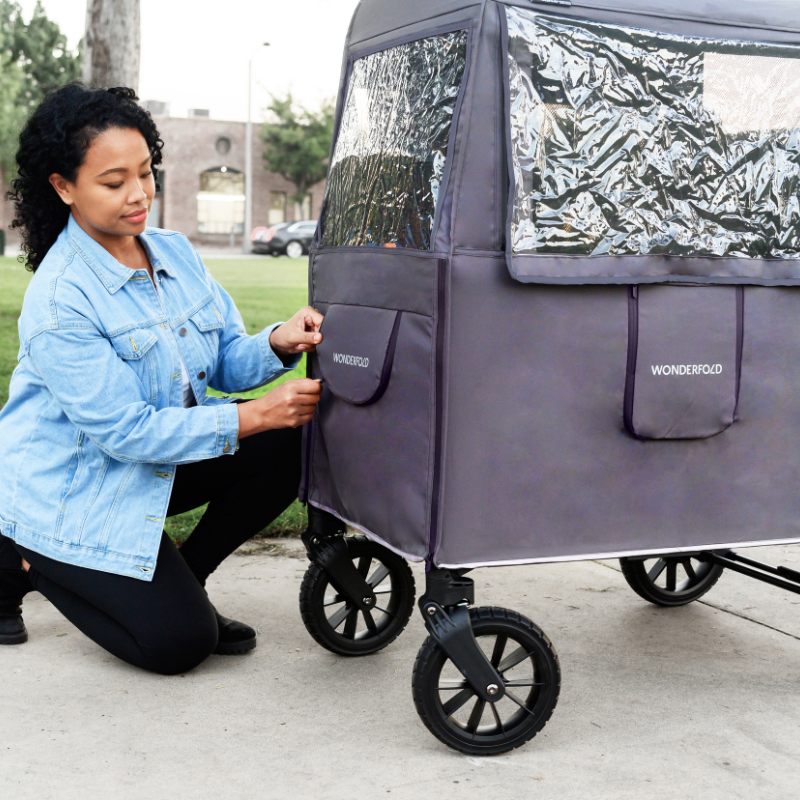 Stroller wagon with weather cover and storage space